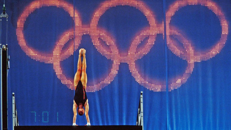 Handstand vor den olympischen Ringen (Quelle: Imago)