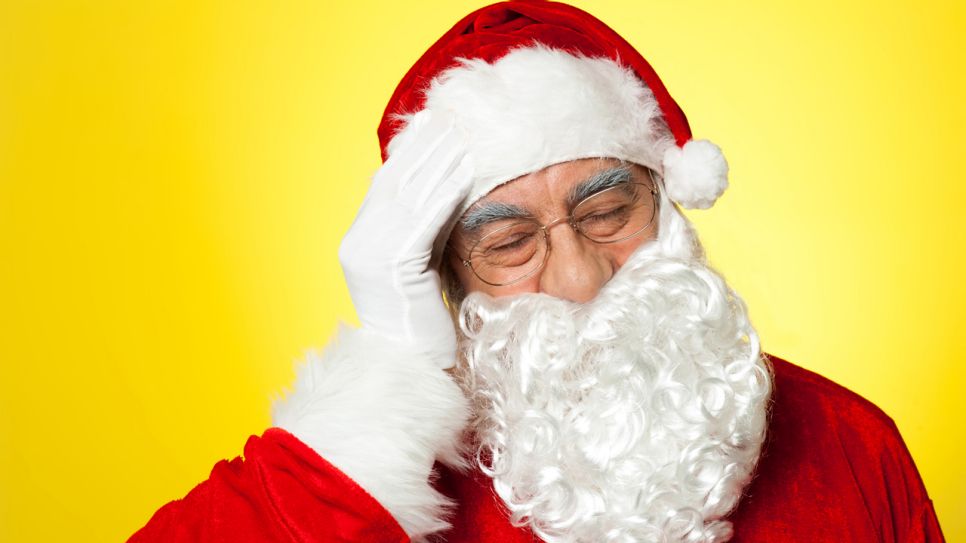 Weihnachtsmann mit Kopfschmerzen, Foto: Colourbox