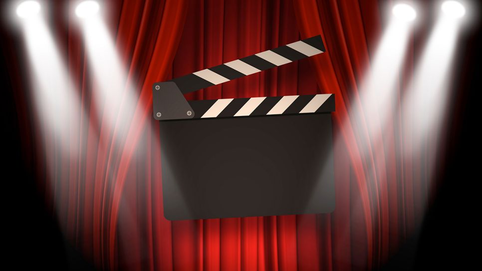 Filmklappe vor rotem Vorhang (Bild: Colourbox)