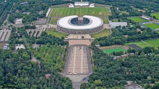 Auf einer Luftaufnahme ist am 07.08.2021 das Berliner Olympiastadion zu sehen. (Luftaufnahme aus einem Helicopter). (Quelle: Picture Alliance/Christophe Gateau)